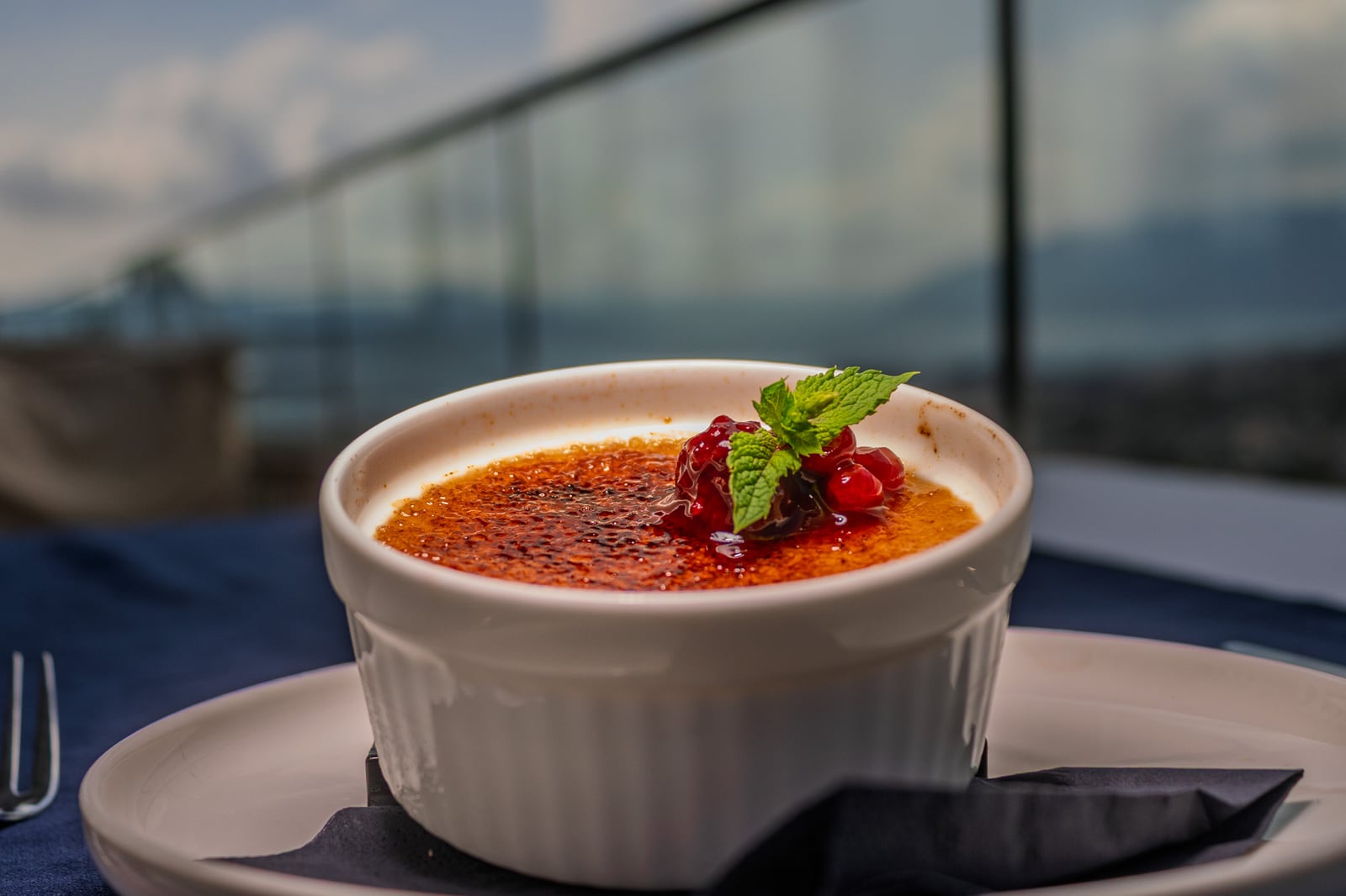 A caramelised dessert with berries and mint at Cielo